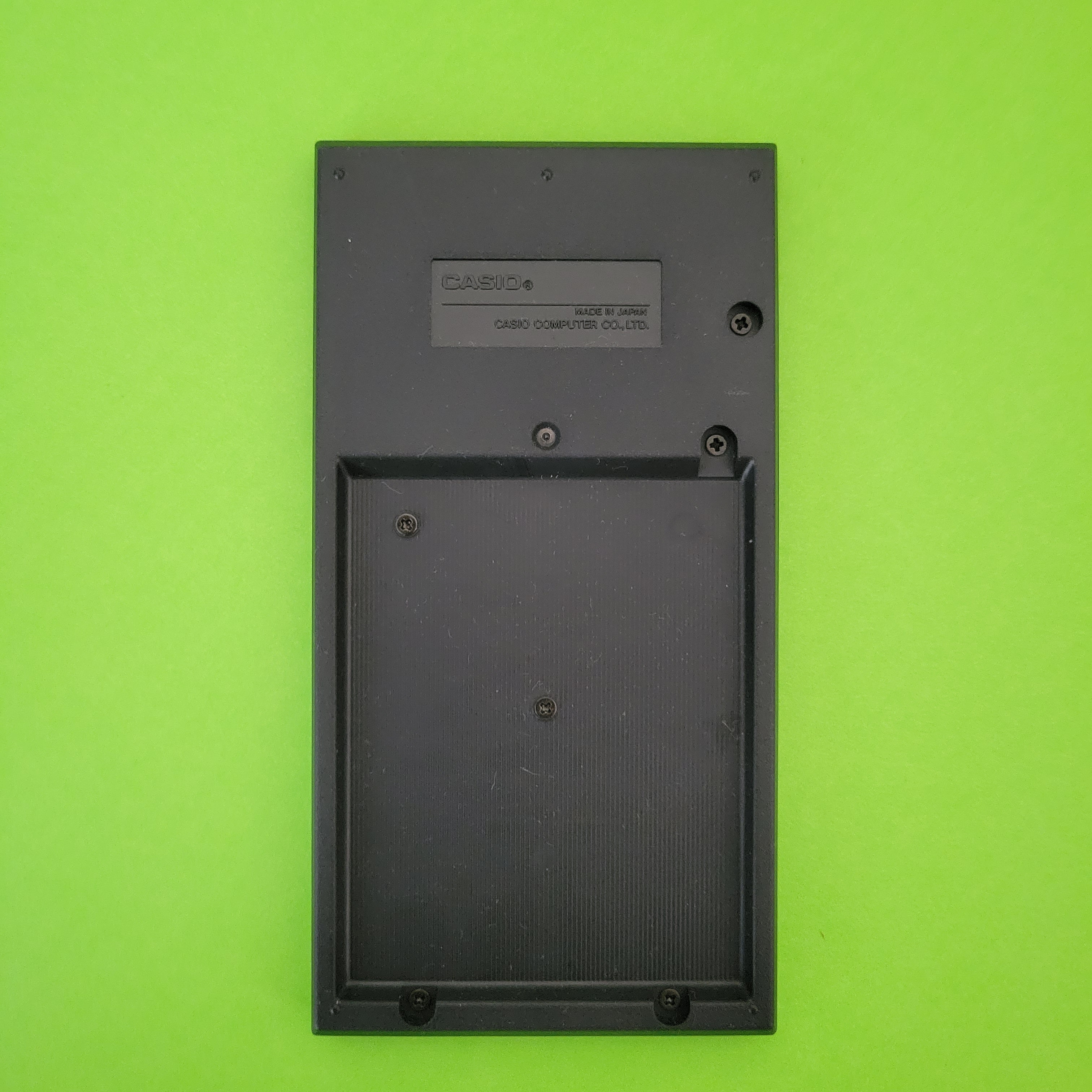 An image of the back of a Casio fx-300v scientific/engineering calculator